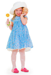 the lovely girl listens to a cockleshell