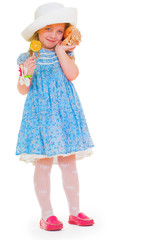 the lovely girl listens to a cockleshell