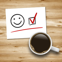 Naklejka premium Kaffeetasse mit Smiley und Checkbox