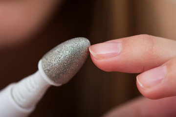 Close-up Of Manicuring Nails