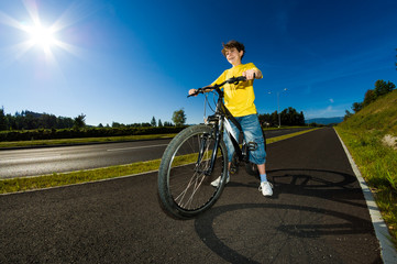 Obraz premium Boy biking