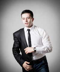 Handsome young businessman wearing suit