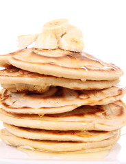 Pancakes with bananas and syrop