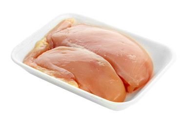 raw chicken meat in plastic tray isolated on white