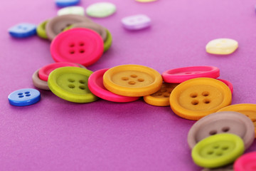 Bright color buttons on a purple background