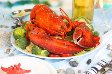Red lobster on platter on serving table close-up