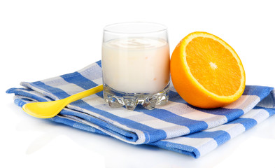 Delicious yogurt in glass with orange isolated on white