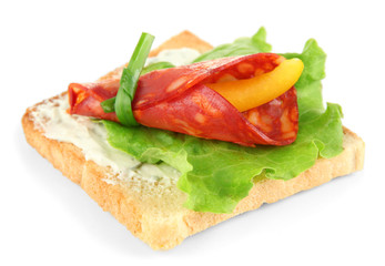 Salami rolls with paprika pieces inside,
