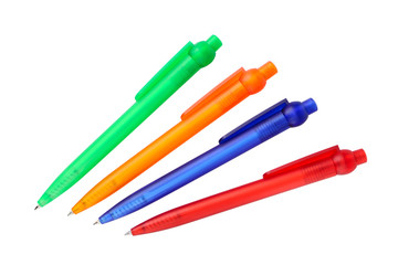 Four multicoloured ball point pens