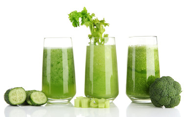 Glasses of green vegetable juice, isolated on white