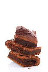Slices of a brownie on white background