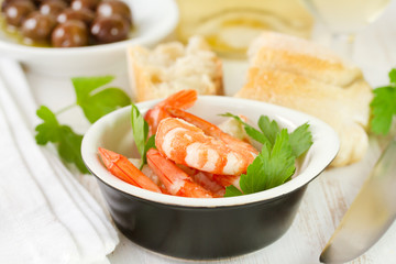 shrimps with parsley in bowl