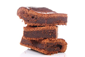 Slices of a brownie on white background