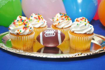 Four Birthday Cupcakes with a Football
