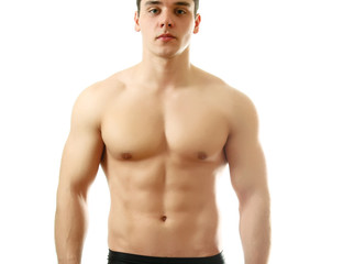 Fototapeta premium Strong man with a helathy body isolated over white background