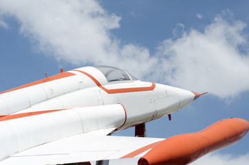 plane on sky against clouds