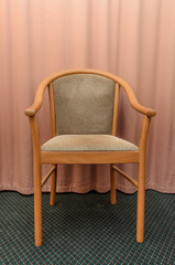 Obraz premium Chair against the curtains