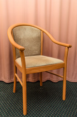 Chair against the curtains