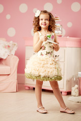 Little sweet girl with tea