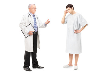 Fototapeta premium Full length portrait of a mature health specialist talking to a