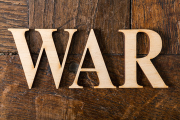 Wooden letters on wooden background