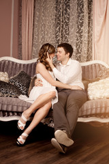 Obraz premium Happy couple in love at home