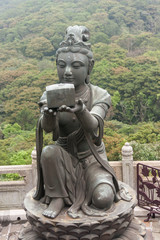 Fototapeta na wymiar deva statue at Po Lin monastery