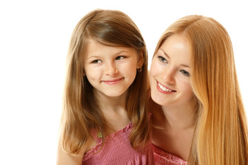 portrait of two sisters happy smiling (child and teen) looking t