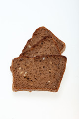 Slices of dark bread isolated over white