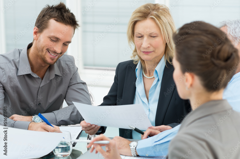 Wall mural happy business people in meeting