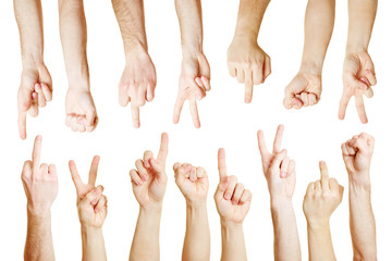 Viele Hände zeigen verschiedene Symbole