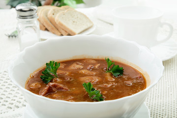 Beans in tomato sauce with bacon