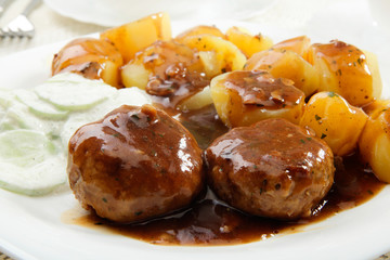 Meatball with sauce and potatos