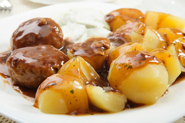 Meatball with sauce and potatos