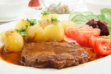 Roasted shoulder with sauce