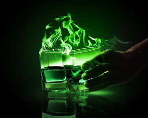 Two glasses of green absinth