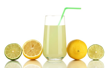 Delicious lemon juice in glass and limes and lemons next to it