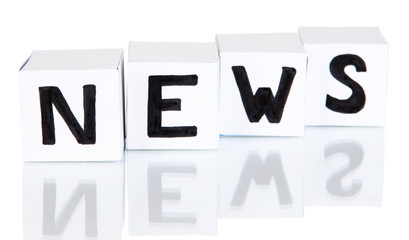 White paper cubes labeled 