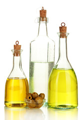 Original glass bottles with salad dressing isolated on white