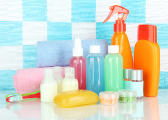 Hotel cosmetics kit on shelf in bathroom