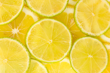 Naklejka na ściany i meble Lime and lemon slices background