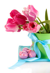 Easter composition with fresh tulips and easter eggs isolated