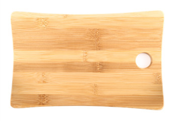 Wooden cutting board over white background