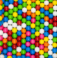 Fototapeta na wymiar Colorful gumballs arranged in a patter