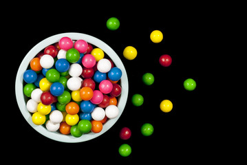 Gumballs bounced out of a bowl