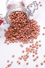 raw lentil vegetables in a preserving jar
