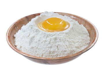 Egg and flour isolated on a white background