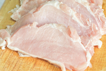 Pork slice on wooden board