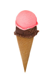 Ice cream scoops in cone over white