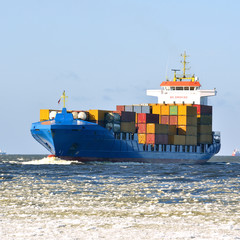 Cargo container ship sailing © Alex Stemmer